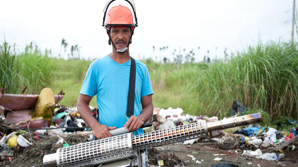 Leo Olobia (49) Fogging Machine Operator. (Photo: Eleanor Farmer/Oxfam)