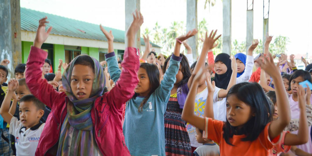 Children participate in a psychosocial support session in Saguairan, Lanao del Sur