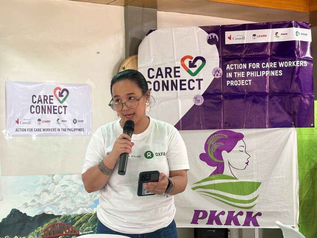 Photo of Oxfam Pilipinas Gender Justice Portfolio Manager talking to project partners and participants at the Care Connect Biliran launch by Oxfam Pilipinas, PKKK, Government of Canada, and local partners. For info, visit oxfam.org.ph
