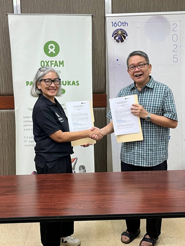 Photo of Oxfam Pilipinas Executive Director Lot Felizco and Manila Observatory Executive Director Fr. Jose Ramon T. Villarin, S.J., renewing the Memorandum of Understanding for enhancing the multi-hazard index to determine the thresholds and triggers for launching an anticipatory action. Anticipatory action refers to proactive measures that reduce the adverse impact of a forecasted disaster. It is the defining concept of Republic Act 12287, or the "Declaration of State of Imminent Disaster Act." Oxfam Pilipinas and Manila Observatory collaborated under the SUPREME BARMM project in 2023 to improve the early warning system and anticipatory action in the Bangsamoro region.