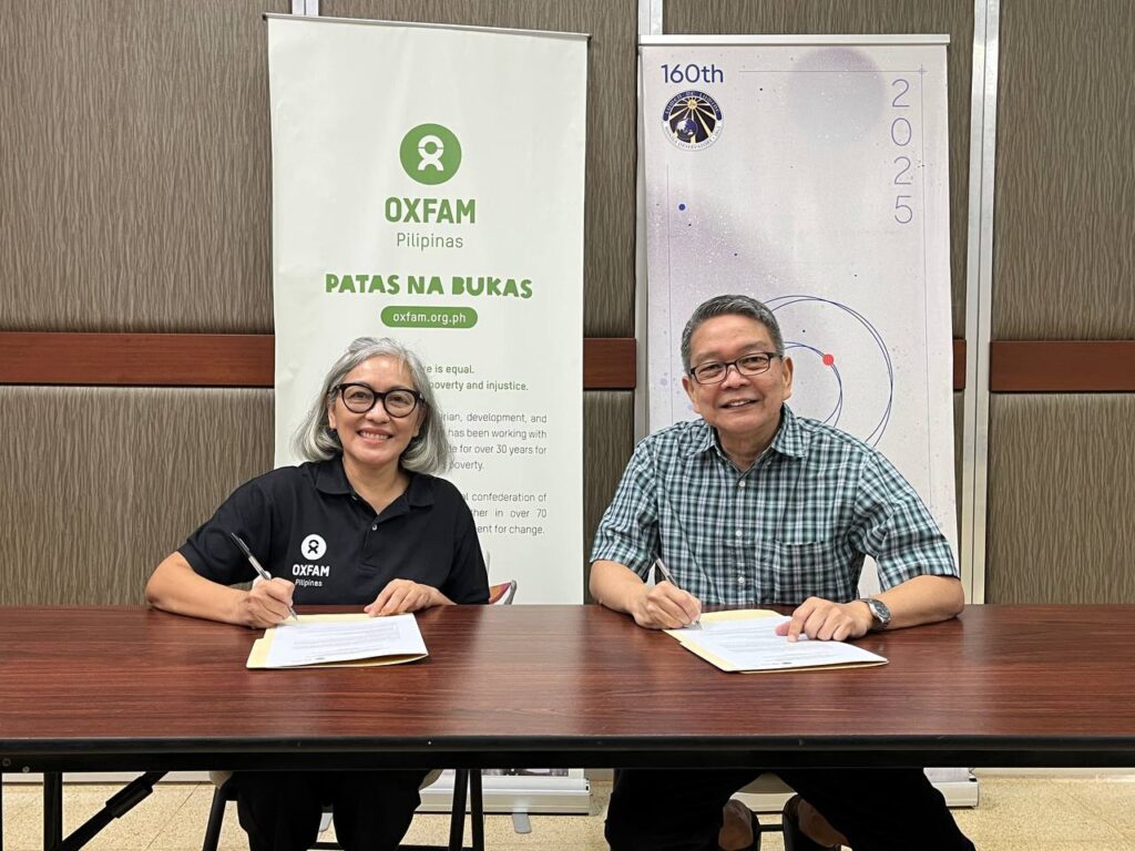 Photo of Oxfam Pilipinas Executive Director Lot Felizco and Manila Observatory Executive Director Fr. Jose Ramon T. Villarin, S.J., renewing the Memorandum of Understanding for enhancing the multi-hazard index to determine the thresholds and triggers for launching an anticipatory action. Anticipatory action refers to proactive measures that reduce the adverse impact of a forecasted disaster. It is the defining concept of Republic Act 12287, or the "Declaration of State of Imminent Disaster Act." Oxfam Pilipinas and Manila Observatory collaborated under the SUPREME BARMM project in 2023 to improve the early warning system and anticipatory action in the Bangsamoro region.