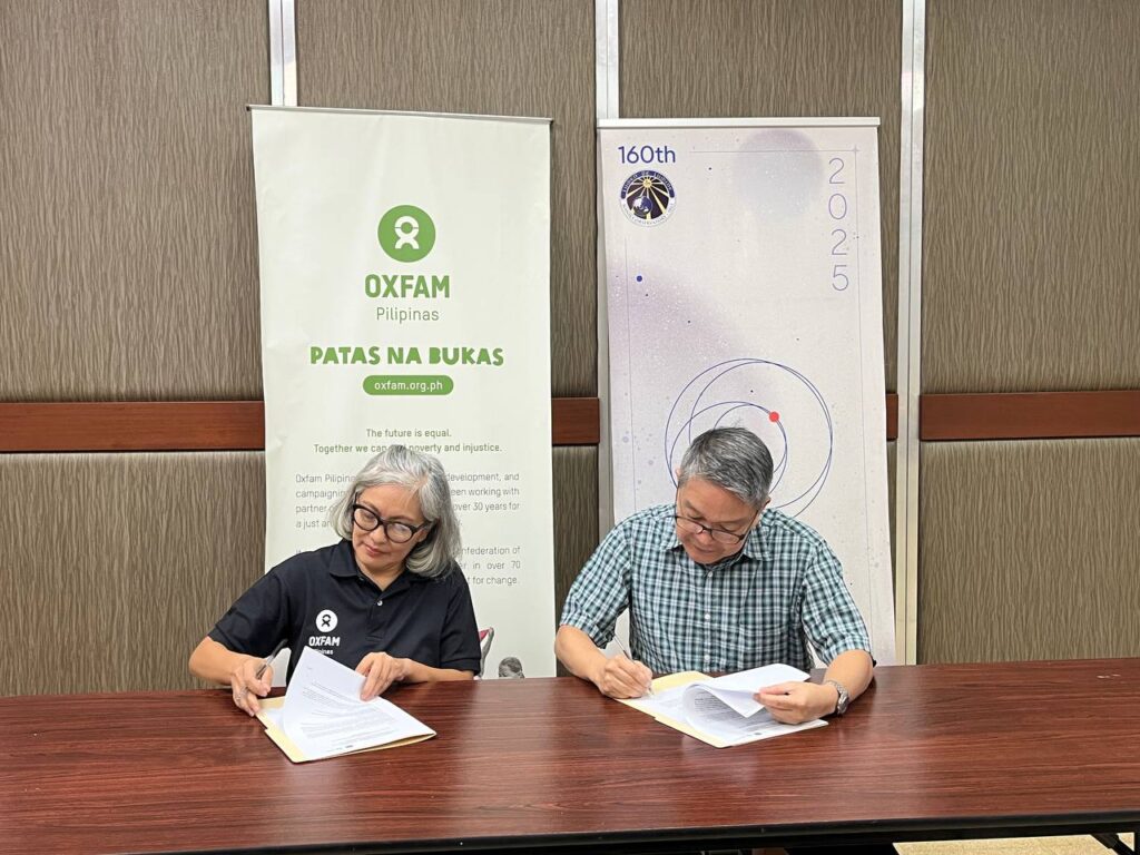 Photo of Oxfam Pilipinas Executive Director Lot Felizco and Manila Observatory Executive Director Fr. Jose Ramon T. Villarin, S.J., renewing the Memorandum of Understanding for enhancing the multi-hazard index to determine the thresholds and triggers for launching an anticipatory action. Anticipatory action refers to proactive measures that reduce the adverse impact of a forecasted disaster. It is the defining concept of Republic Act 12287, or the "Declaration of State of Imminent Disaster Act." Oxfam Pilipinas and Manila Observatory collaborated under the SUPREME BARMM project in 2023 to improve the early warning system and anticipatory action in the Bangsamoro region.
